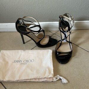 Jimmy Choo strappy patent leather heels.